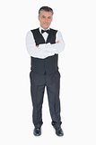 Waiter with crossed arms