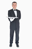 Waiter holding silver tray