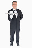 Waiter serving cup of coffee