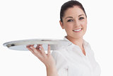 Smiling woman holding tray