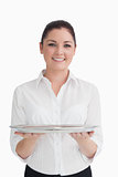 Waitress holding tray with two hands