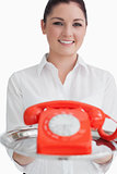 Smiling woman holding a tray