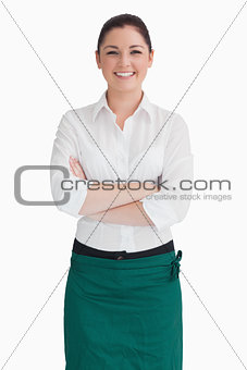 Waitress with crossed arms