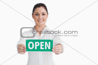 Waitress with open sign