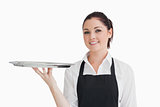 Waitress holding empty tray