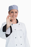 Smiling chef giving the ok sign