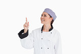 Happy chef pointing up