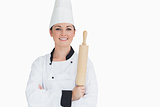 Happy cook holding a rolling pin