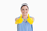 Cleaner giving thumbs up with yellow gloves