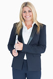 Smiling business woman posing with a clipboard