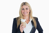 Smiling business woman holding a coffee cup
