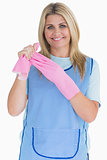 Cleaner woman removing pink gloves