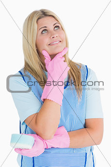 Cheerful cleaner thinking