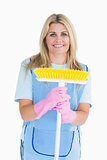 Cleaner woman holding a broom