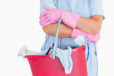 Cleaner holding a pink bucket