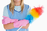 Cleaning woman holding feather duster