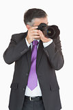 Businessman taking a picture