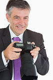 Smiling man looking at pictures