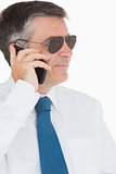 Smiling businessman during call