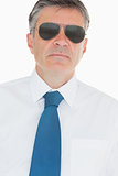Serious businessman wearing sunglasses