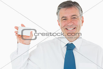 Smiling man with business card