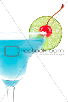 Blue cocktail with cherry and lime slice