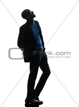 african black man standing looking up  smiling silhouette