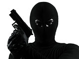 thief criminal terrorist holding gun portrait