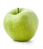 A ripe green apple with water drops
