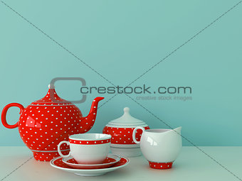Red dishware on a blue background