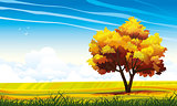 Autumn tree and meadow on a blue sky.
