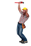 Plumber gesturing on white background
