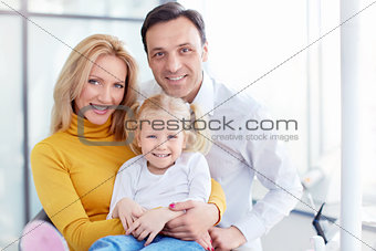 Family in dental clinic