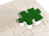 a puzzle piece of grass