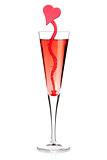 Red champagne alcohol cocktail with heart decoration