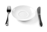 Fork, knife and empty white plate