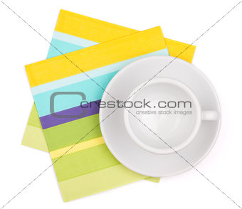 Empty white cup on placemat