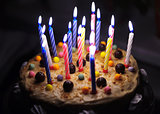 Cake with candles with cream