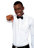 African businessman pointing at you