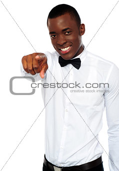 African businessman pointing at you
