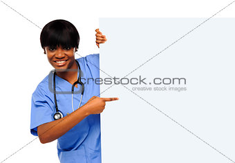 Medical expert pointing towards placard