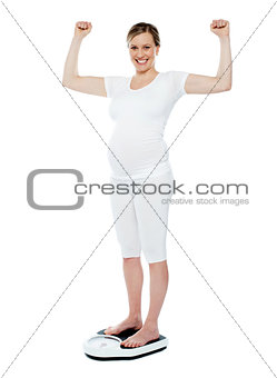 Excited pretty pregnant woman