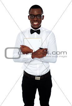 African guy holding spiral notebook