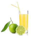 Lime juice glass with ripe limes