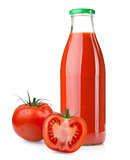 Bottle of tomato juice and ripe tomatoes