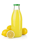 Bottle of lemon juice and fresh lemons