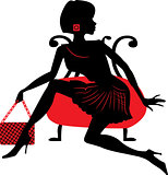 Silhouette of woman with a bag