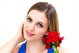 woman with a flower and thinking about love