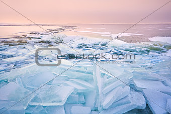 broken shelf ice pieces at sunset on North sea