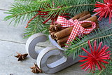 Christmas composition - a wooden sleigh with gifts and fir tree  branches